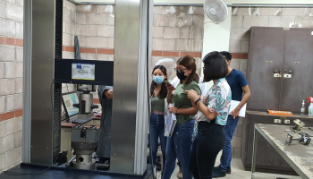 Students in round steel cutting test